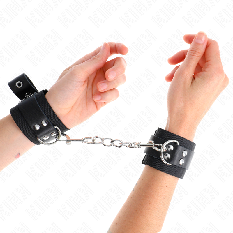 KINK menottes de poignet noires en nylon avec lanière en cuir